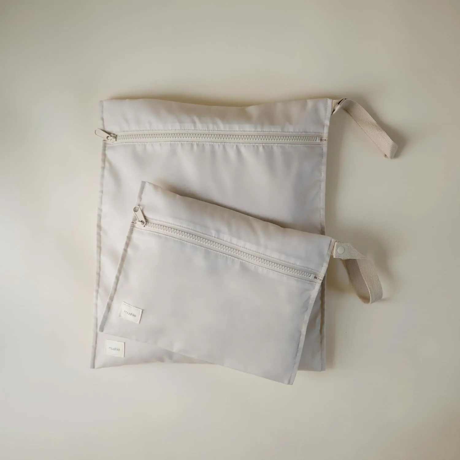 mushie Water Resistant Wet Bags | Large & Small Reusable Storage Bag for Baby Items and Travel | Zippered Pockets with Handle | Machine Washable, Set of 2 (Fog)